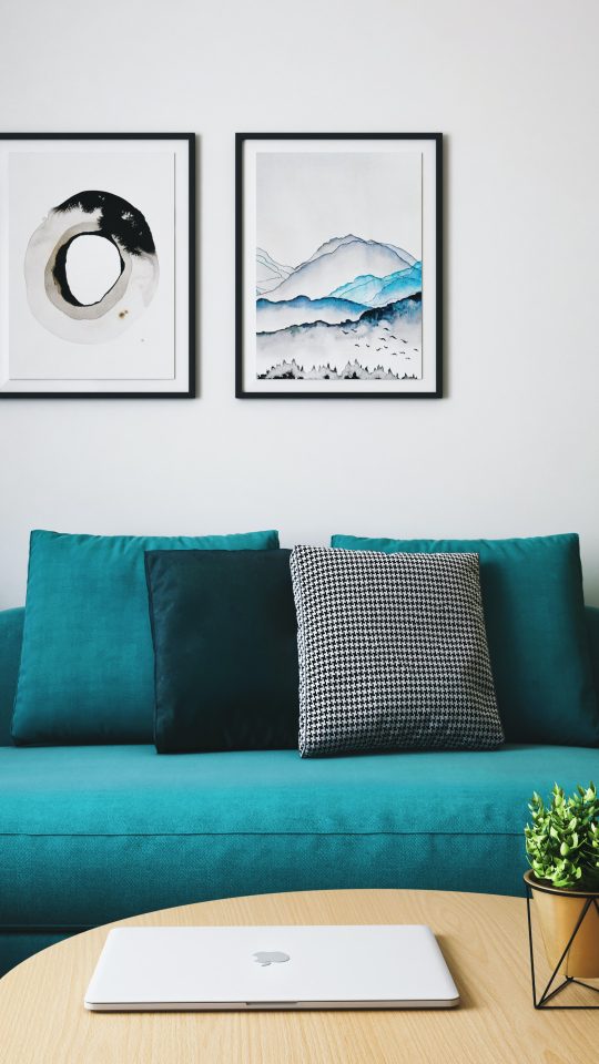 Turquoise sofa and art